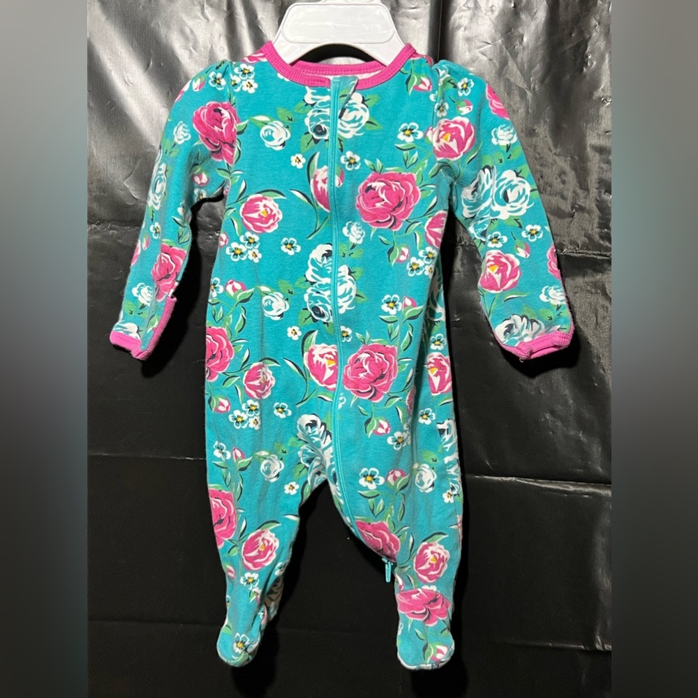 Flower print long sleeved footie onesie